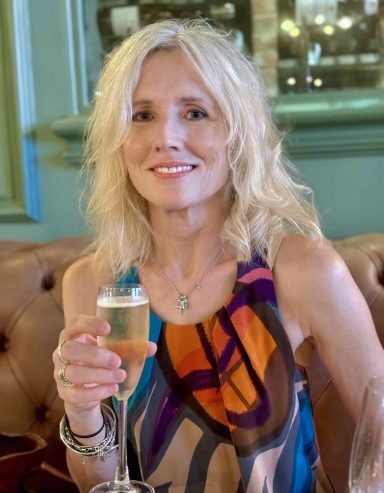 2025 Mature female model enjoying a drink in a relaxed cafe lifestyle portrait