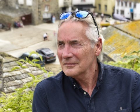 2024 Mature male model in casual portrait outdoors with thoughtful expression